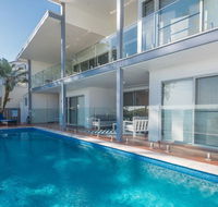 Hamptons Coastline Retreat- Waterfront with a Heated Pool