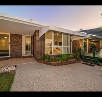 Woorim Secluded Palms Cottage - Accommodation NT