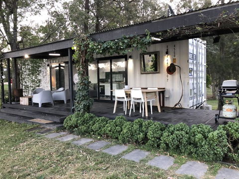 Absolute Riverfront Shipping Container Cabin - NT Tourism 0