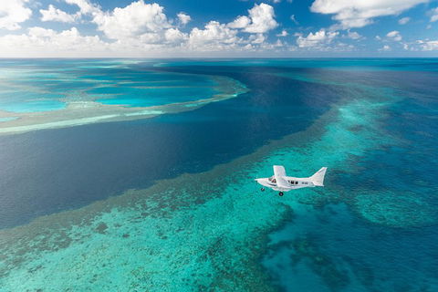 Great Barrier Reef Scenic Flight And Ocean Rafting Whitehaven Beach Day Trip - Accommodation NT 3